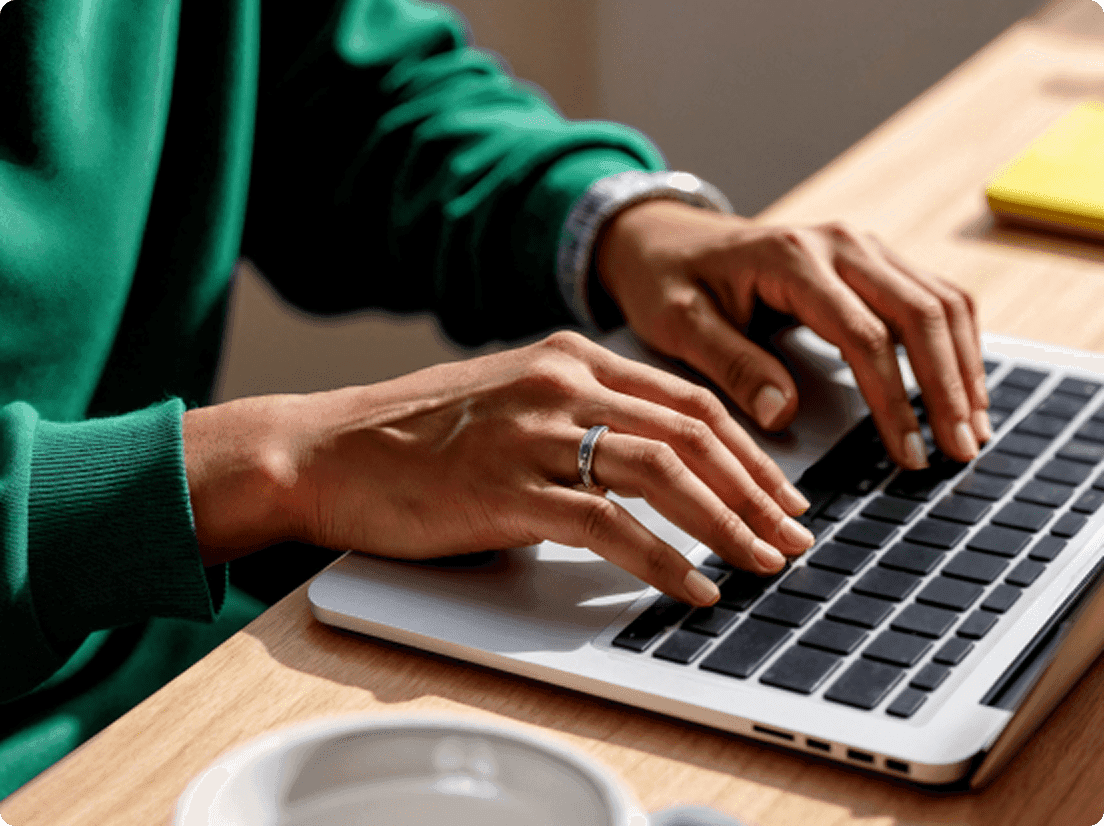 Person typing on laptop